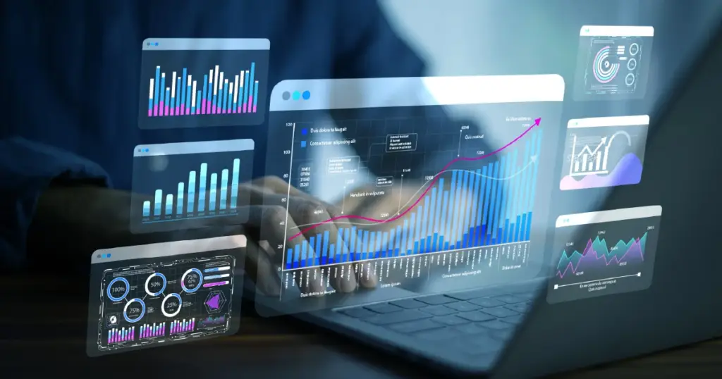 Gráficos e dashboards de análise de dados exibidos em uma tela de computador portátil, representando tendências e crescimento em análise de dados.